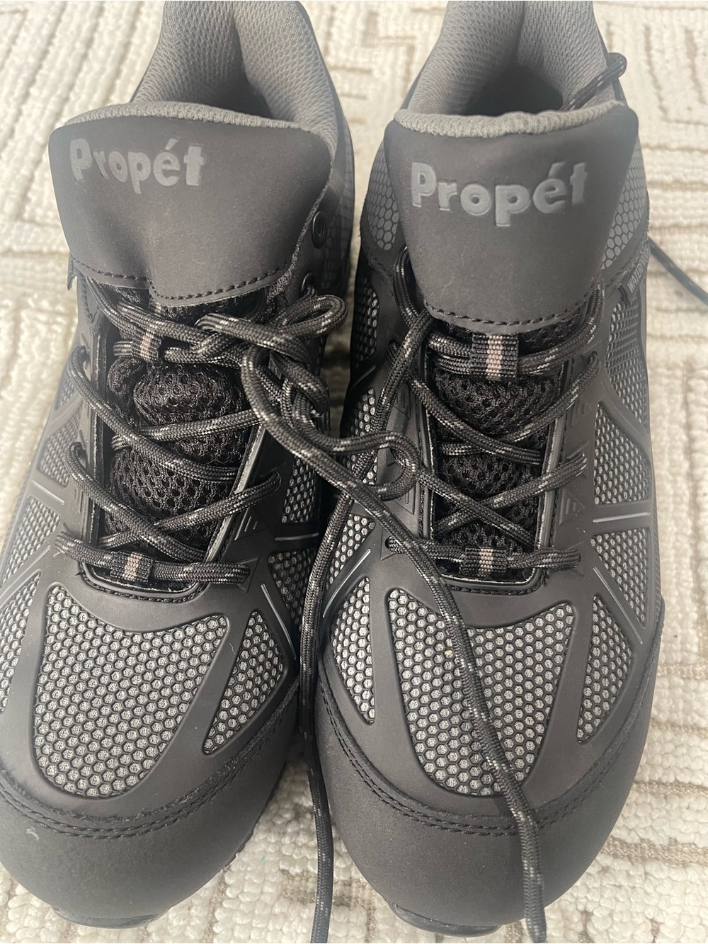 Propet Men’s Black Mesh Athletic Sneakers shoe with a metal toe cap